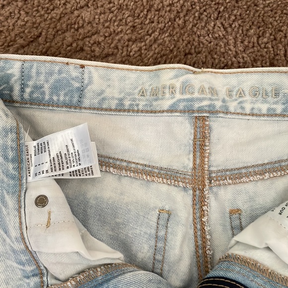 American Eagle light washed mom jean. Slightly distressed - Picture 2 of 3
